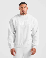 Cozy up in the Academy Oversized Sweater Grey Marl, featuring a relaxed fit and soft fabric for effortless everyday style.