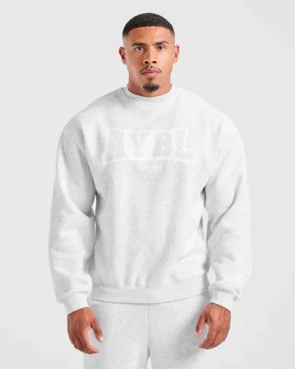 Cozy up in the Academy Oversized Sweater Grey Marl, featuring a relaxed fit and soft fabric for effortless everyday style.